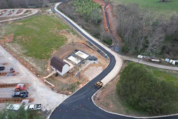 A winding paved drive seen from the air
